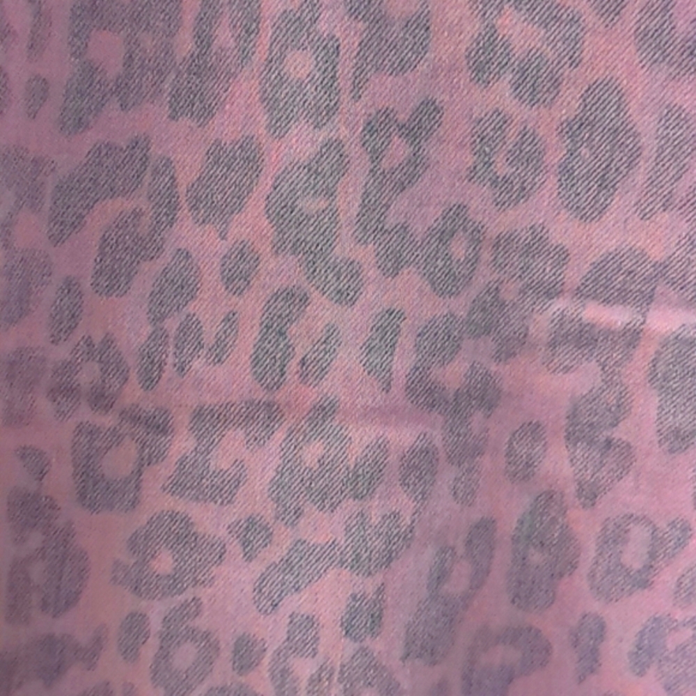 Light pink washed leopard print skinny jeans
